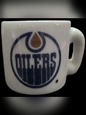 White Edmonton Oilers mini ceramic mug featuring the classic team logo